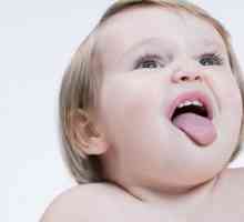 Dijete žuta jezik za oblaganje: uzroci i liječenje